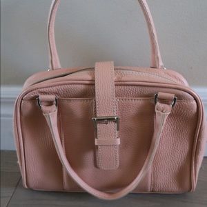 Guia’s pink Italian leather handbag